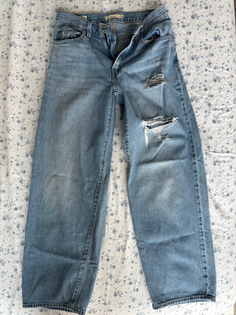 Levi's Light Blue Distressed Women's Relaxed Jeans from Aritzia